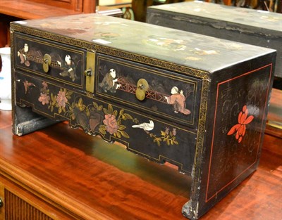 Lot 1409 - A Chinese black lacquer lap desk and a Chinese porcelain bottle vase, painted in underglaze...