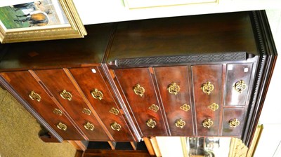 Lot 1426 - A George III mahogany chest on chest, the dentil cornice above an arrangement of drawers,...