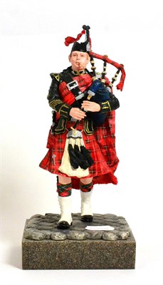 Lot 102 - Border Fine Arts 'The Piper', model No. B1020 by Paul Back, limited edition 75/600, on faux...