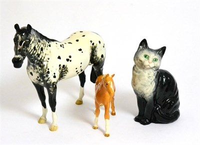 Lot 119 - Beswick Appaloosa Stallion, model No. A1772, black and white gloss and Foal (Larger...