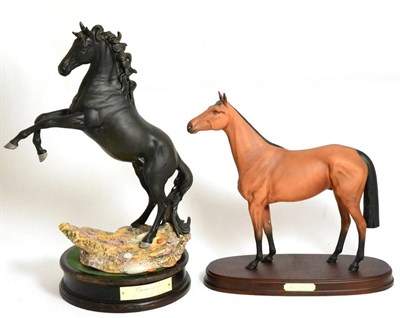 Lot 141 - Beswick Connoisseur Horses Red Rum, model No. 2510, on wooden plinth and Cancara - The Black Horse