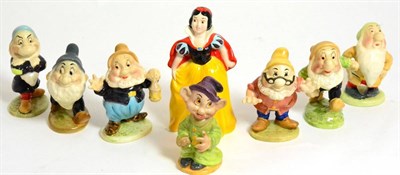 Lot 167 - Beswick Snow White, Second Version, model No. 1332B; together with the Seven Dwarfs: Dopey,...