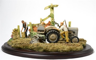 Lot 174 - Country Artists Tractor Model 'End of the Ridge', on wood base, with box