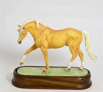 Lot 202 - Royal Worcester 'Palomino Stallion ";Yellow Straw";, (1971), model No. RW3882 by Doris Lindner,...