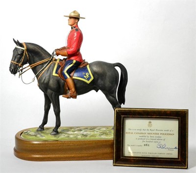 Lot 205 - Royal Worcester 'Royal Canadian Mounted Police', (1966), model No. RW3805 by Doris Lindner, limited