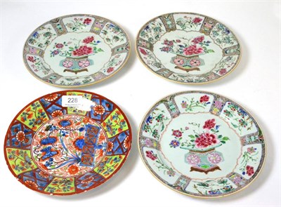 Lot 228 - A set of three Chinese plates and a clobbered plate