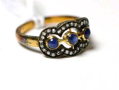 Lot 260 - ~A sapphire and diamond ring