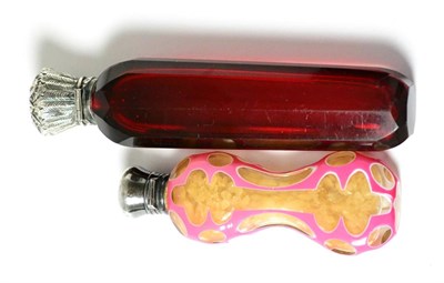 Lot 280 - A late Victorian ruby tinted scent bottle and a late 19th/early 20th century pink glass overlay...