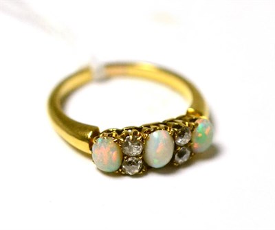 Lot 295 - An opal and diamond ring