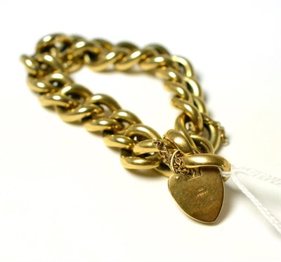 Lot 300 - A 9ct gold curb and lock bracelet