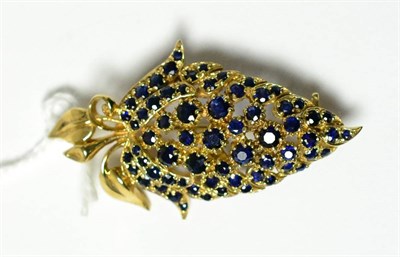 Lot 312 - A 9ct gold gold and sapphire leaf brooch