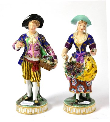 Lot 318 - A pair of 19th century porcelain figures (a.f.)