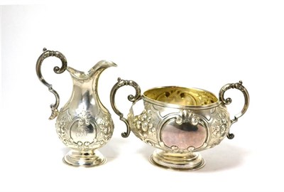 Lot 323 - A Victorian silver milk jug and sugar