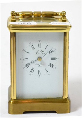 Lot 326 - A brass striking carriage clock, dial signed L'Epee