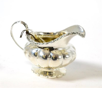 Lot 337 - A silver cream jug, London 1831