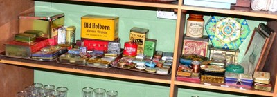 Lot 351 - A quantity of advertising tins (on two shelves)