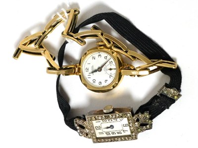 Lot 379 - A 9ct gold lady's wristwatch together with a Continental silver cocktail watch