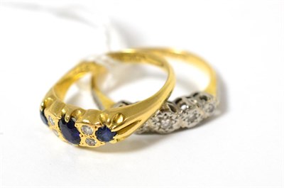 Lot 380 - An 18ct gold sapphire and diamond ring together with a five stone diamond ring