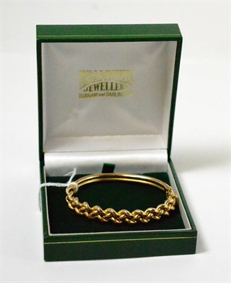 Lot 386 - 15ct gold wax filled bangle