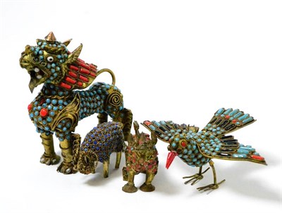 Lot 403 - Four jewelled animal models