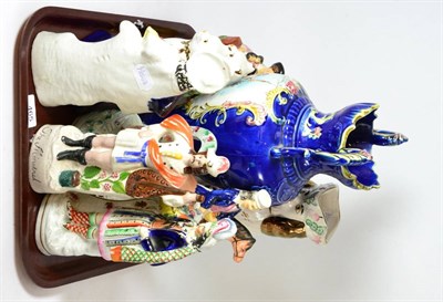 Lot 465 - A collection of assorted Staffordshire pottery animals and figures and a continental...