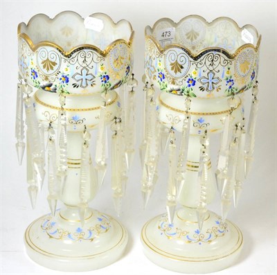 Lot 473 - A pair of opaque milk glass lustres with two tiers of drops and gilt decoration