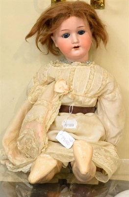 Lot 521 - Heubach & Koppelsdorf bisque head doll, impressed 250.3, with brown wig, composition jointed...