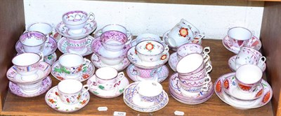 Lot 529 - A shelf of 19th century pink lustre tea cups and saucers