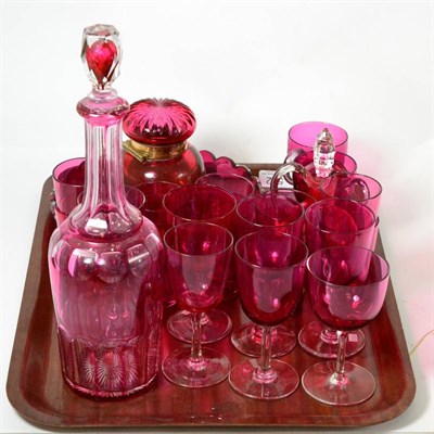 Lot 542 - A collection of cranberry glass including a large inkwell