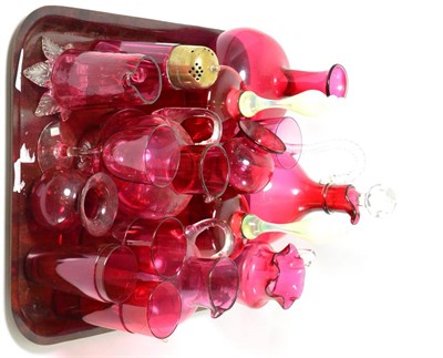 Lot 547 - A collection of cranberry glass including a pair of bells