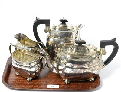 Lot 552 - A composite four piece silver tea set Chester 1937/1940 comprising teapot, hot water pot, sucre and