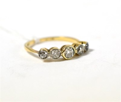 Lot 571 - An 18ct gold five stone diamond ring