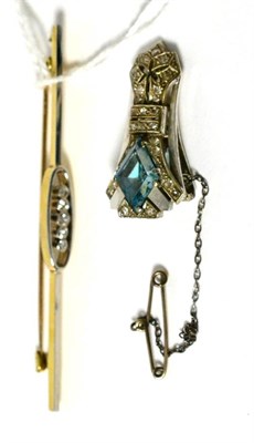 Lot 599 - A diamond bar brooch and a diamond and blue stone lapel clip