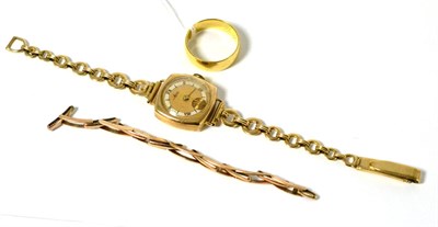 Lot 601 - An 18ct gold band ring, a 9ct gold watch and watch strap