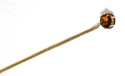 Lot 602 - A citrine pendant on chain