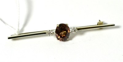 Lot 612 - A zircon and diamond bar brooch