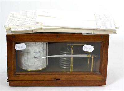 Lot 652 - Casella barograph with eight vacuum sections, brass frame with steel cross pieces, on base numbered