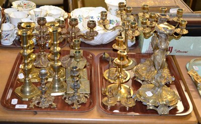 Lot 656 - ~Various pairs of 19th century and later brass and other candlesticks and candelabra (on two trays)