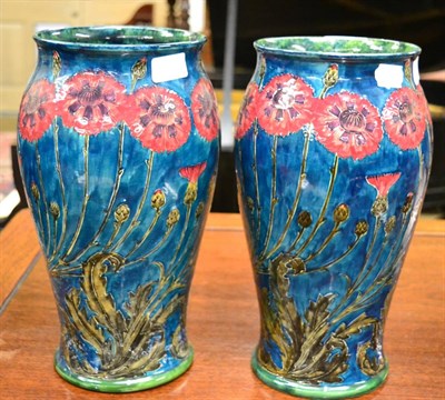 Lot 676 - A pair of Morris ware vases decorated with poppies (a.f.)