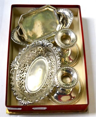 Lot 708 - A pierced silver dish, a small twin handled silver dish, a Continental silver dish stamped...