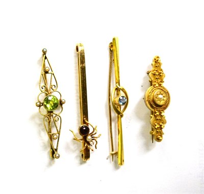 Lot 711 - Three 15ct bar brooches and one 9ct bar brooch (4)