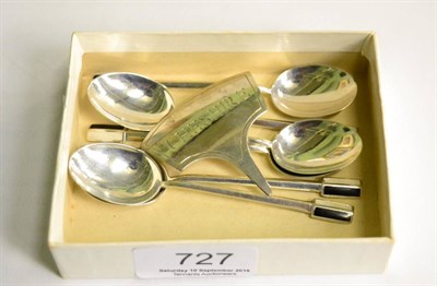 Lot 727 - A set of six Art Deco coffee spoons, Birmingham 1933 and a cheese label, Birmingham 1969