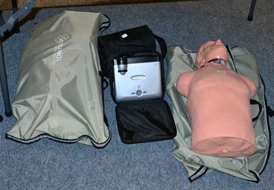 Lot 1074 - Two Simulaids CPR training aids and two digital projectors