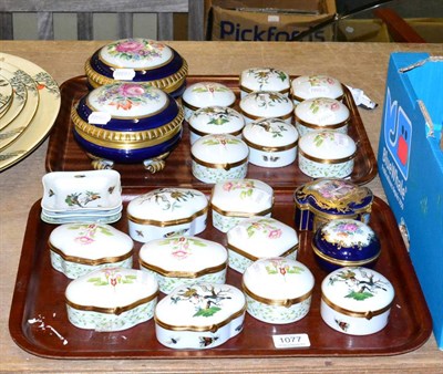 Lot 1077 - ~A collection of floral and bird painted Limoges Ceralene boxes and others including Austrian...