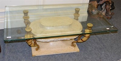 Lot 1133 - A composition period style glass top pedestal table decorated with swags and scrolls