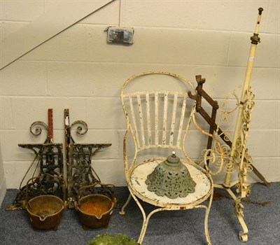 Lot 1146 - A quantity of metal wares, two Victorian wall brackets, coaching jack, painted metal chair,...