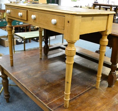 Lot 1167 - A pine side table/washstand with two drawers