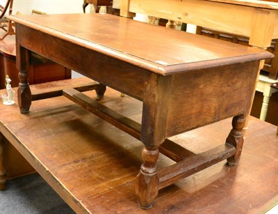 Lot 1170 - An oak coffee table