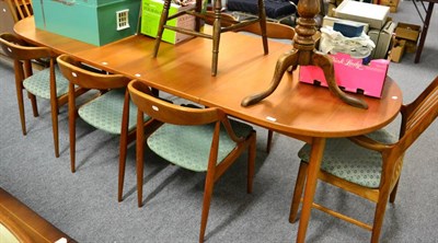 Lot 1177 - A teak dining room suite