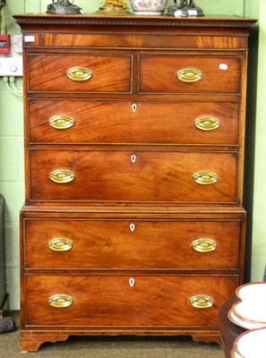 Lot 1305 - A George mahogany chest on chest of small proportions